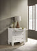 Cream white Sandy Beach 3-drawer nightstand by CoasterEssence, showing its sleek furniture design with smooth drawers and modern style.