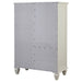 Cream white Sandy Beach 8-drawer door chest by CoasterEssence, featuring a sturdy wooden furniture design with multiple drawers and sleek door fronts.