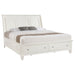 Cream white Sandy Beach Wood Eastern King Storage Panel Bed by CoasterEssence, showing the elegant headboard and storage drawers.