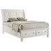 Cream white Sandy Beach Wood Queen Storage Panel Bed by CoasterEssence, featuring a stylish panel headboard and spacious storage drawers.