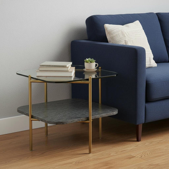 HomeRoots glass and metal square end table with shelf, featuring a gold frame and clear glass top and shelf.