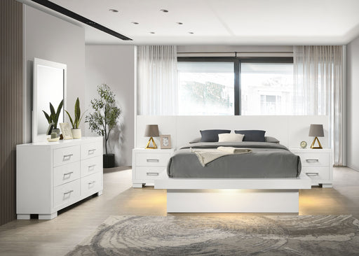 Jessica 5-piece Eastern King LED bedroom set by CoasterEssence includes a snow white bed frame, nightstands, and matching furniture.