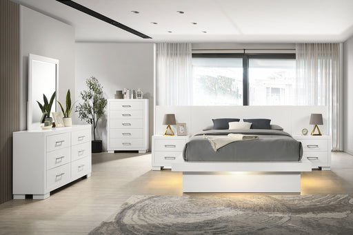 CoasterEssence Jessica 6-piece Eastern King LED bedroom furniture set in snow white, includes bed, nightstands, and storage drawers.
