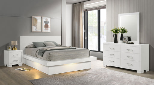 Jessica 4-piece Queen LED bedroom furniture set by CoasterEssence in snow white, featuring a bed, nightstands, and dresser.