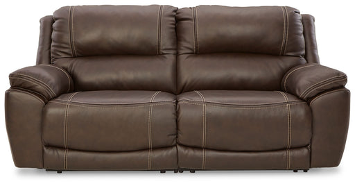 Dunleith 2-piece power reclining loveseat in chocolate fabric by Signature Design Ashley, showing plush cushions and reclining mechanism.