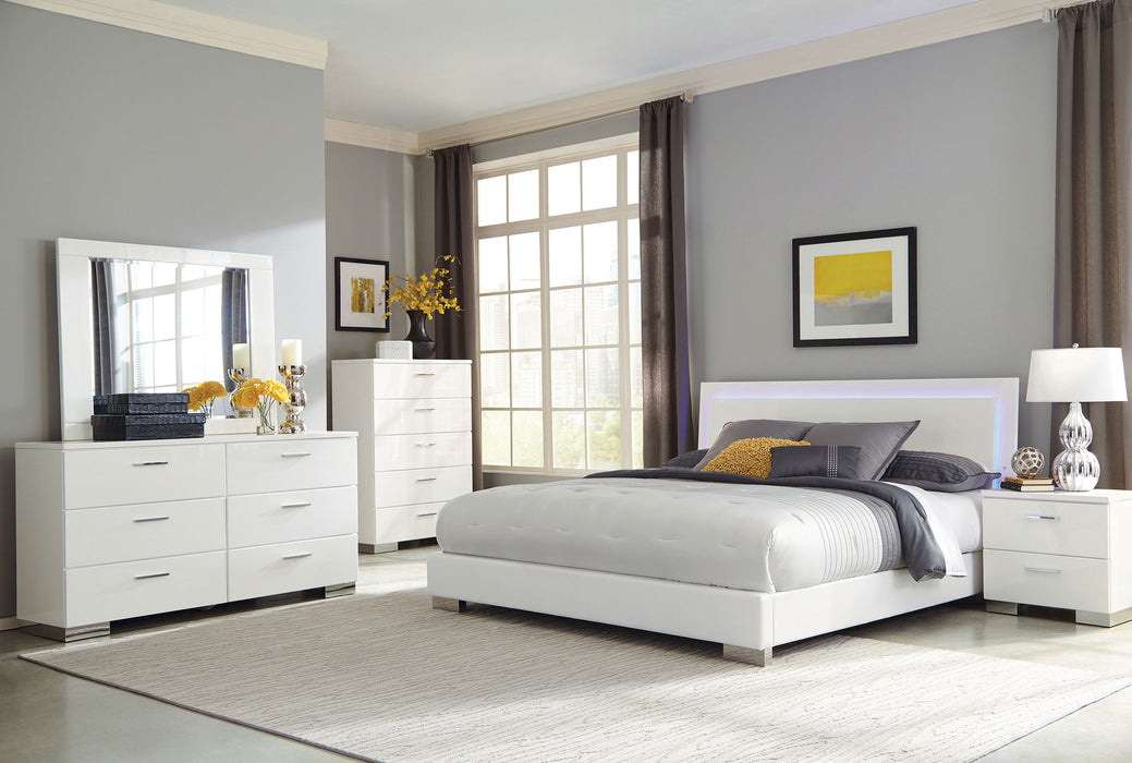 White high gloss Felicity Wood Eastern King LED panel bed by CoasterEssence with sleek modern design and built-in LED lighting.