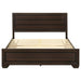 Dark cocoa wooden Eastern King Storage Panel Bed by CoasterEveryday, showing a detailed view of the bed's headboard and storage panels.