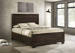 Dark cocoa Kauffman Wood Queen Storage Panel Bed by CoasterEveryday, showing the elegant wooden headboard and storage drawers.