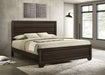 Eastern King Panel Bed by CoasterEveryday in dark cocoa wood finish, showcasing a sturdy wood frame and classic design.
