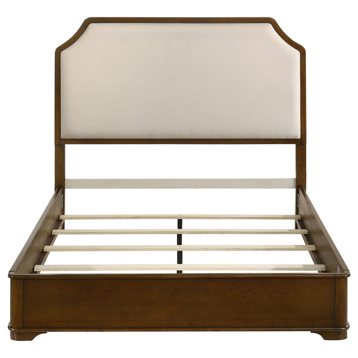 Cream and brown cherry 58-inch Queen Panel Bed by CoasterEveryday showing the upholstered headboard and wooden frame.