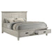 Distressed white Franco Wood Eastern King Storage Panel Bed by CoasterEssence, showcasing its elegant wooden design and storage panels.