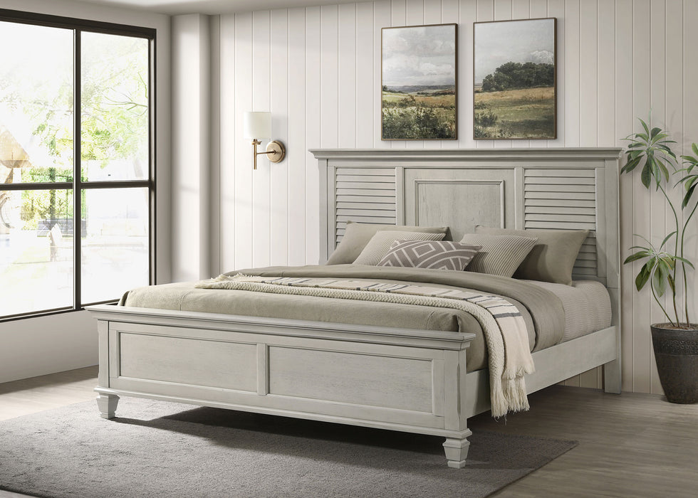 CoasterEssence Franco Wood Eastern King Panel Bed in distressed white finish, showcasing the elegant wooden frame and headboard.