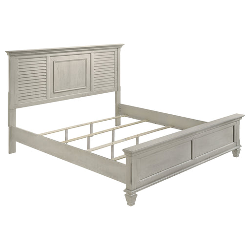 Distressed white Franco Wood Eastern King Panel Bed by CoasterEssence, showcasing a classic wooden bed frame with detailed panel design.