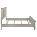 CoasterEssence Franco Wood Eastern King Panel Bed in distressed white with a classic wooden design and headboard.