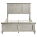 Distressed white Franco Wood Queen Panel Bed from CoasterEssence, showcasing the elegant headboard and classic furniture design.