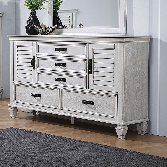 Distressed white Franco 5-drawer dresser by CoasterEssence, showcasing sleek furniture design with metal handles and spacious storage drawers.