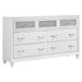 CoasterEveryday Barzini 4-piece Eastern King bedroom set in white, includes bed frame, nightstands, and dresser with modern design