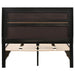 Black Miranda 51-inch wood full storage panel bed by CoasterEveryday, showing the headboard and built-in storage drawers.