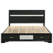 Black 51-inch California King Storage Panel Bed from CoasterEveryday with wood finish and modern design, showcasing the headboard and storage panels.