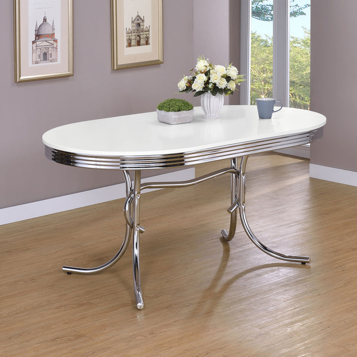 Retro oval 60-inch wood top dining table with white finish and chrome legs, showcasing a stylish CoasterEveryday furniture piece.