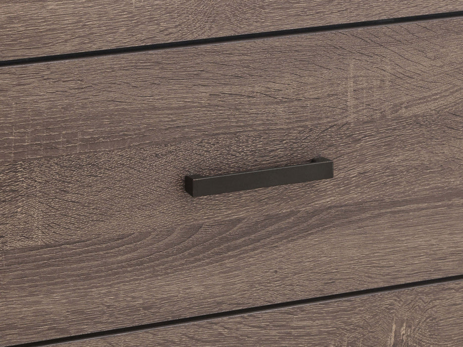 CoasterEveryday Brantford 6-drawer dresser in barrel oak wood with sleek modern design and metal handles.