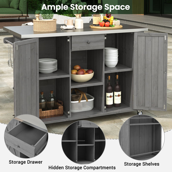 Giga outdoor kitchen island with stainless steel top, storage, towel and spice racks, and a bottle opener, designed for outdoor cooking.