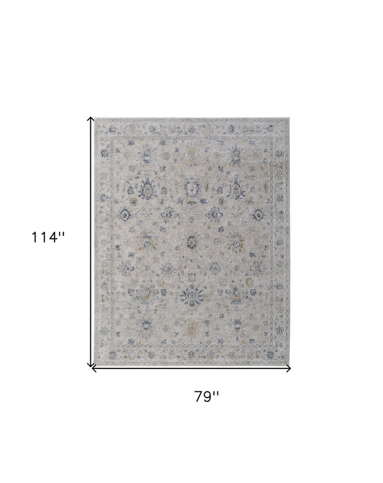 6.6' x 9.5' Floral Power Loom Worn Faded Area Rug With Fringe - Ivory Taupe And Blue