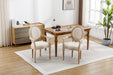 Set of two Giga French vintage upholstered fabric dining armchairs with curved wooden arms and plush cushions.