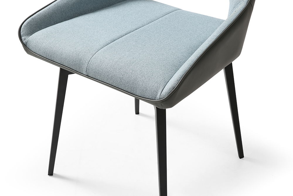 ESF swivel dining chair with a modern design, featuring a cushioned seat and backrest in a sleek, contemporary style.