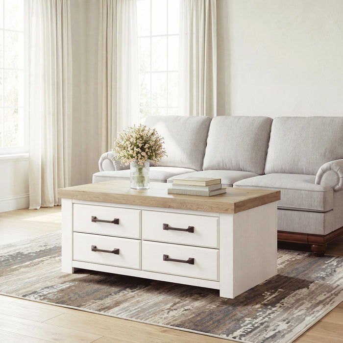 Rectangular cocktail table from Signature Design by Ashley, featuring a sleek wooden surface and sturdy legs.