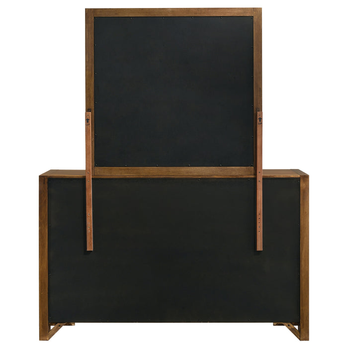 CoasterEveryday Adderley 8-drawer bedroom dresser with matching mirror in warm brown wood finish, showcasing spacious storage and elegant design.