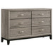 CoasterEveryday Valen four-piece full bedroom set in light taupe with bed frame, dresser, mirror, and nightstands.