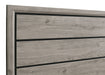Light taupe California King panel bed by CoasterEveryday featuring a sleek wooden frame and modern furniture design.