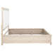 Queen panel bed in washed oak finish, 66-inch size, showcasing the CoasterEveryday Pembroke furniture with a sturdy wooden frame.