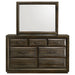 Dark oak Atlas 7-drawer bedroom dresser with matching mirror from CoasterEveryday, showcasing sleek modern furniture design.