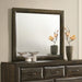 Dark oak Atlas bedroom dresser mirror by CoasterEveryday, reflecting a sleek, modern furniture piece with a sturdy frame.