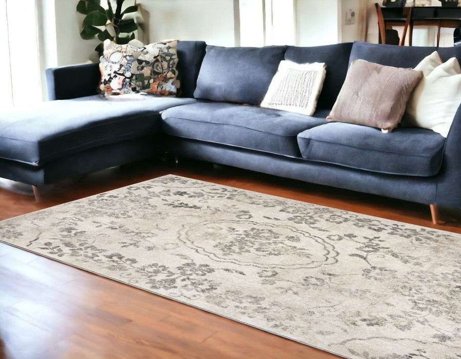 8' x 10' Machine Woven Distressed Floral Traditional Indoor Area Rug - Gray