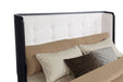 Leandro 4-piece California King bedroom set in burnished black featuring a bed frame, nightstands, and dresser from CoasterEveryday.