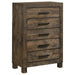 Rustic golden brown Woodmont 5-drawer bedroom chest by CoasterEveryday, showcasing wooden drawers and antique-style hardware.