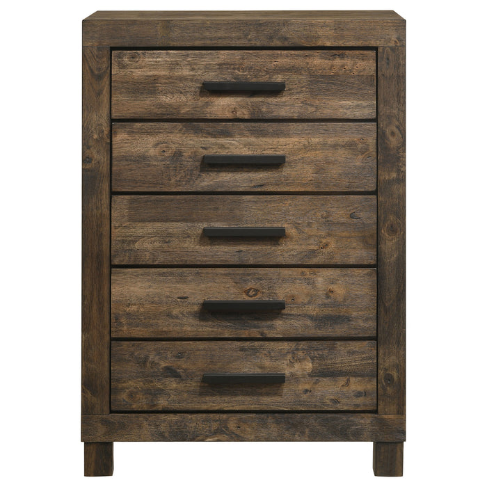 Woodmont 5-drawer rustic bedroom chest in golden brown wood finish, featuring classic furniture style and sturdy construction.