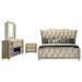 Lorient 4-piece California King bedroom set by CoasterEveryday in ivory and camel with a bed, nightstands, and dresser.