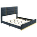 Ines 4-piece Eastern King bedroom set in navy and white high gloss with matching bed frame, nightstands, and dresser from CoasterEveryday