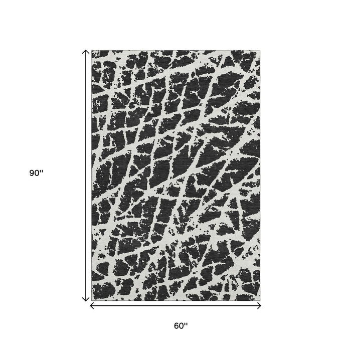 5' X 8' Abstract Washable Area Rug With UV Protection (646520) - Black / Ivory