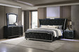 Lorient black California King bedroom set by CoasterEveryday includes four furniture pieces with sleek, modern design and clean lines.