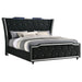 Black upholstered California King LED bed by CoasterEveryday featuring a modern furniture design and built-in LED lighting.