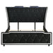 Black California King LED upholstered bed from CoasterEveryday featuring a modern, padded headboard and sleek furniture design.