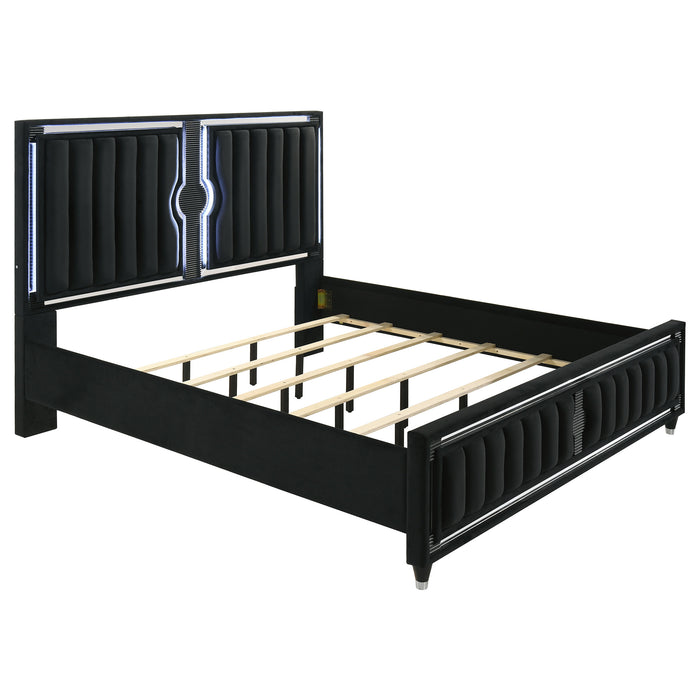 Black Ravenne velvet upholstered Eastern King LED panel bed by CoasterEveryday, showcasing the elegant headboard and sleek design.