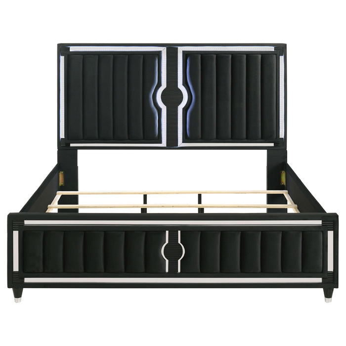 Black Ravenne velvet upholstered Eastern King LED panel bed by CoasterEveryday with a sleek, modern design and illuminated headboard.