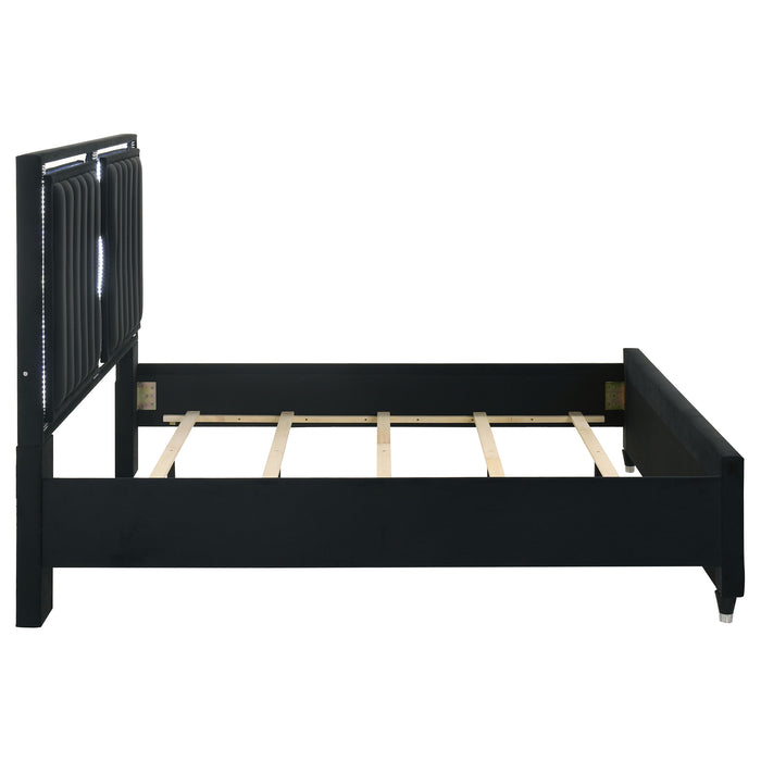 Black Ravenne velvet upholstered Eastern king LED panel bed by CoasterEveryday with modern furniture design.