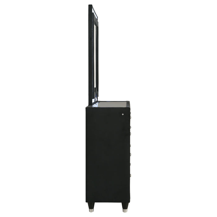 Black Ravenne 8-drawer velvet upholstered LED dresser with matching mirror by CoasterEveryday, showcasing sleek modern bedroom furniture.